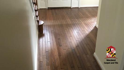 Sanded and refinished dark hardwood flooring