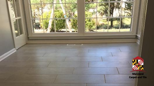 Beautiful tile flooring in this dinning room, great lighting