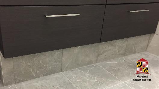A closer look at the Acura bathroom floors and cabinet installation